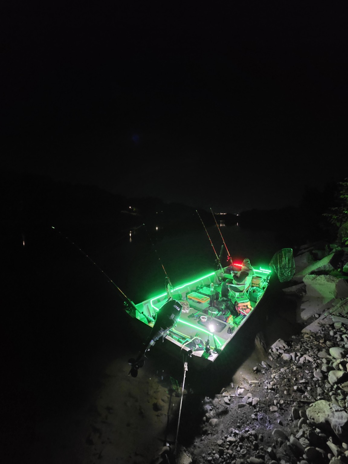 CatManDue Jon Boat on the Susquehanna River illuminated with green night lights